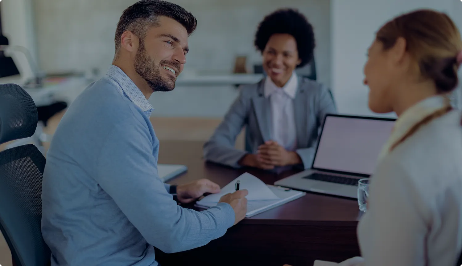 Two professionals discussing partner onboarding